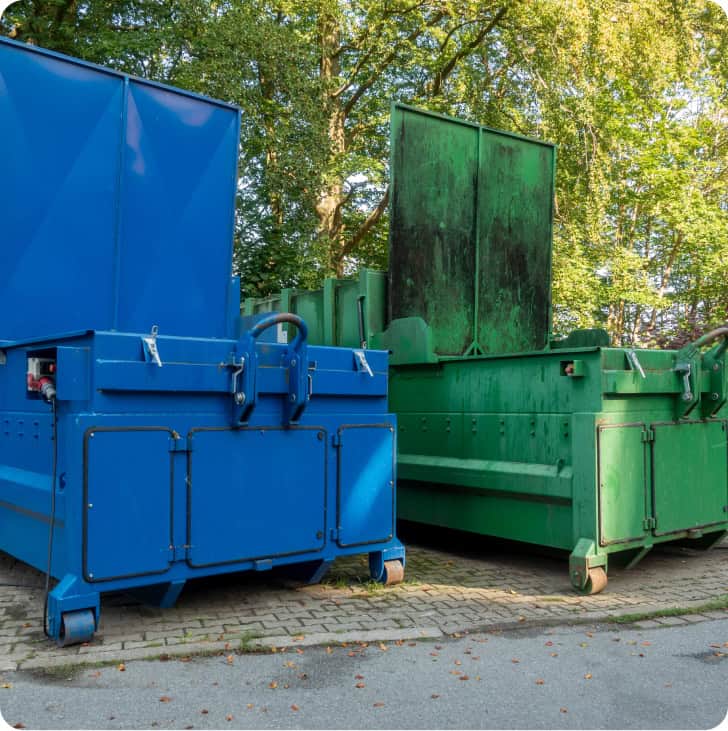 Industrial waste containers for recycling and waste disposal.