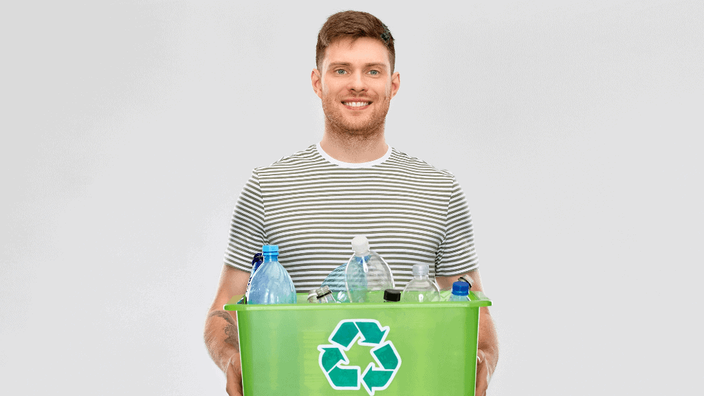Recycling expert holding bottles with waste management symbols.