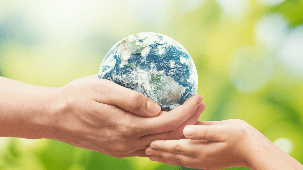 Hands holding Earth to symbolize sustainability and waste solutions.