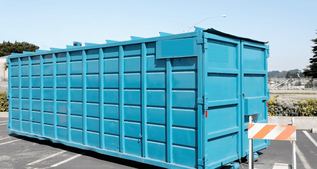 Large blue waste container for spring cleaning and waste management refresh.