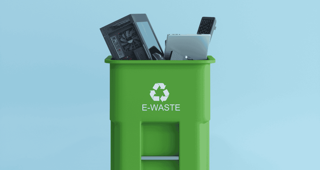 E-waste recycling bin with electronic devices, promoting eco-friendly waste disposal during spring c.