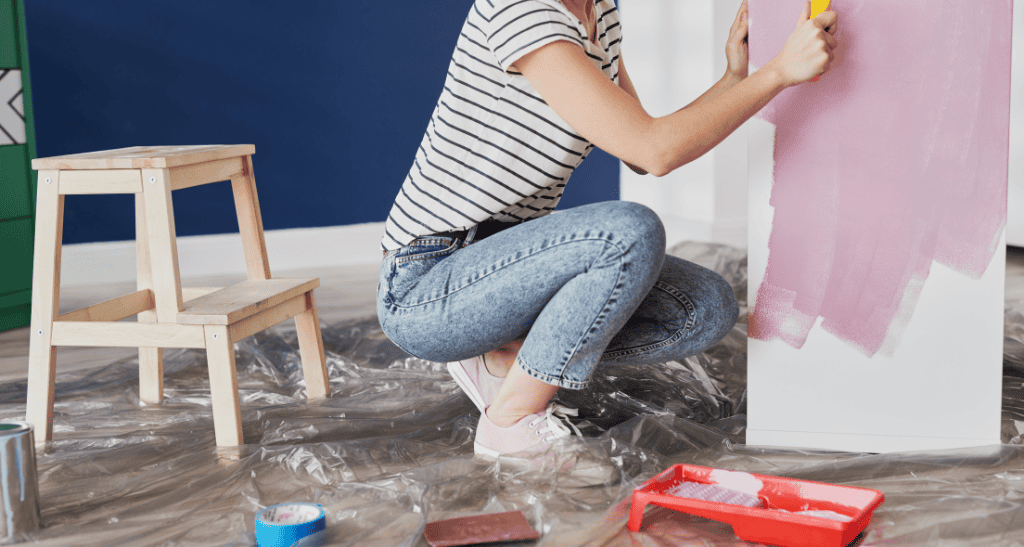Small business painting eco-friendly waste management solutions for Earth Day.