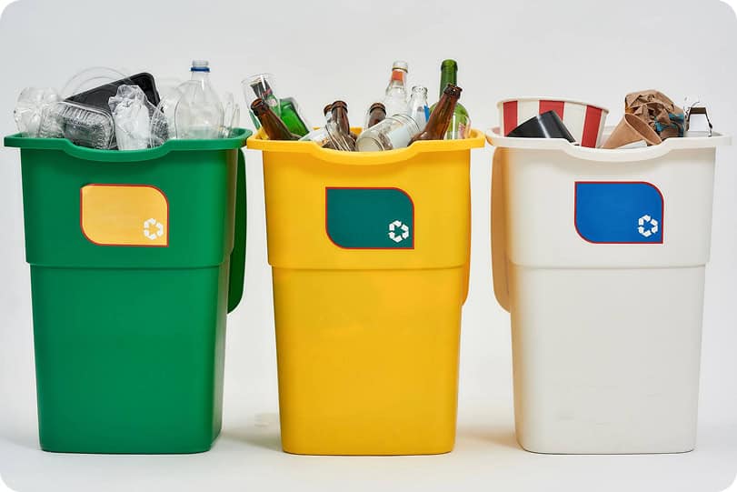 Color-coded recycling bins for waste separation and recycling solutions.