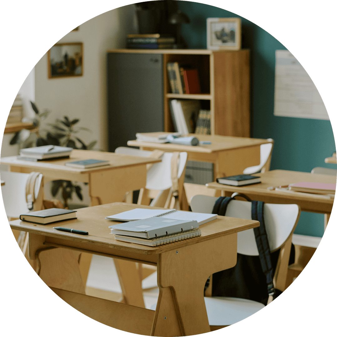 Classroom setting with desks and educational materials for waste management training.
