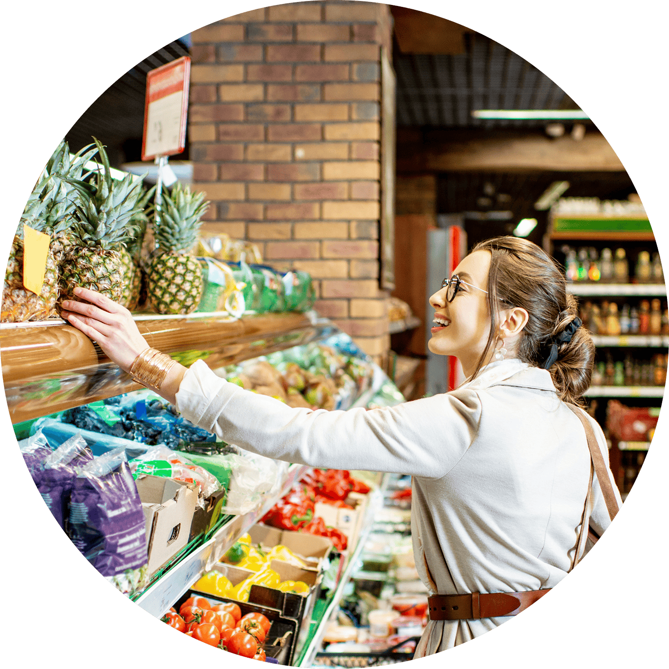 Woman shopping for fresh fruits and vegetables at grocery store.
