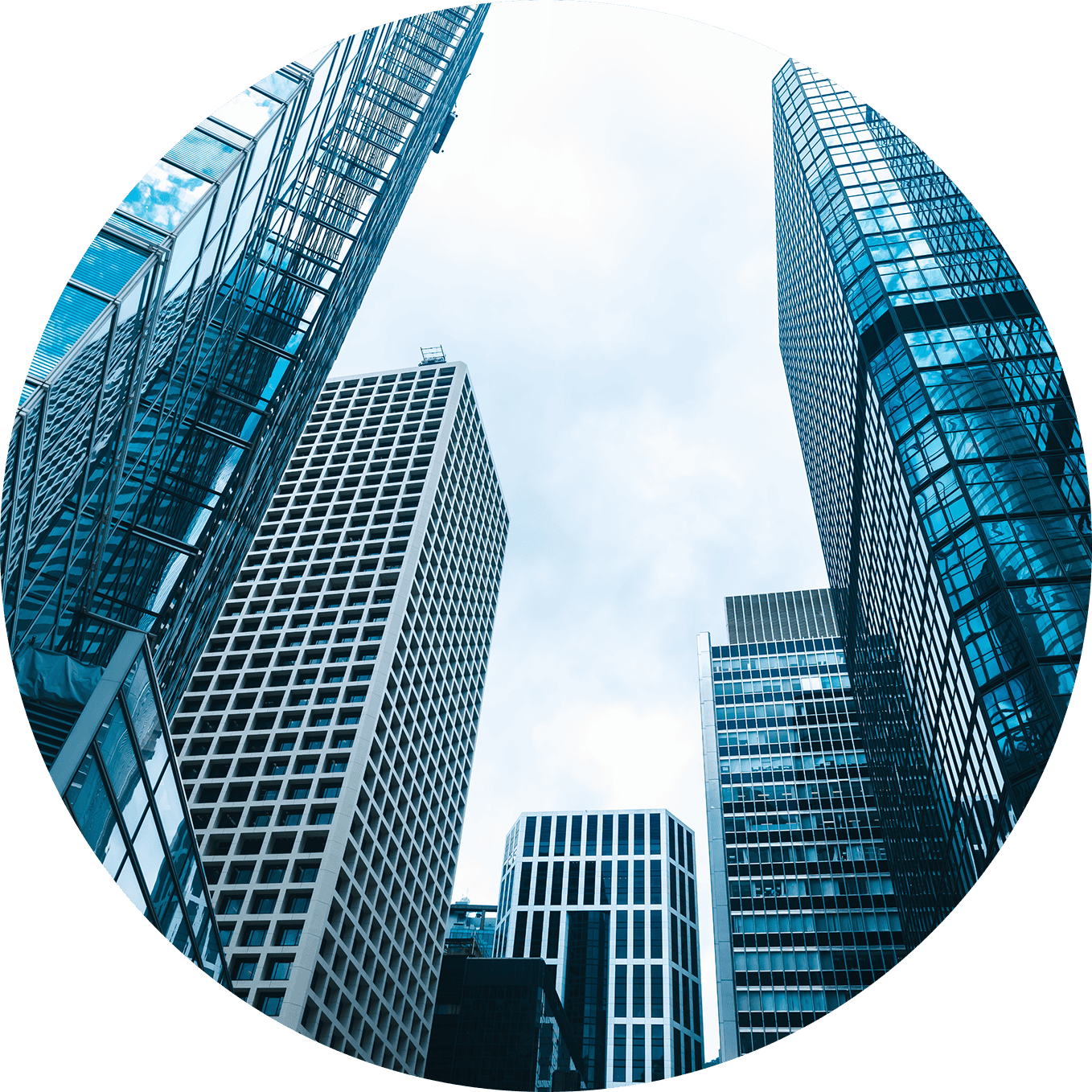 Modern office buildings in a city skyline with reflective glass exteriors.