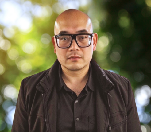 Portrait of a man with glasses outdoors for Waste Solutions.